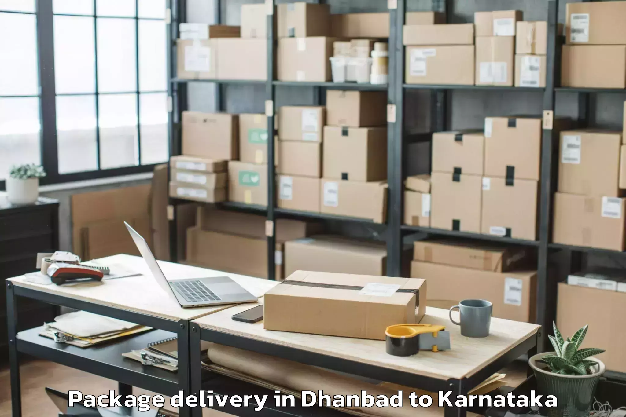 Trusted Dhanbad to Pandavapura Package Delivery